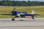 Michael Goulian arriving in his Extra 330SC 