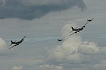 B-17 Flying Fortresses with Mustang escorts