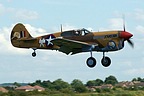 Incoming P-40F Warhawk on final