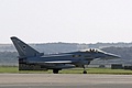 No. 11 Squadron Typhoon FGR.4, ZJ939/DXI, carrying a centreline Litening Designator Pod lands for the static display after arriving in formation with the Vulcan.