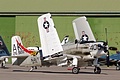 Douglas AD-4N Skyraider, G-RADR, marked as A-1H Skyraider 26922/AK 402 of VA-176 on the USS Intrepid with wings folded during engine start.