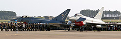 A Spitfire flanked by a pair of Typhoon FGR.4 all in 1 Squadron markings provided a backdrop to the formal parade on Saturday morning