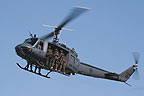 Soldiers preparing to fast rope from the UH-1H