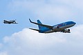 Boeing 737 and P-51 Mustang formation