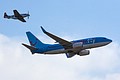 Boeing 737 and P-51 Mustang formation