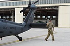 Flight commander performs the walk -round with a visual check of the aircraft