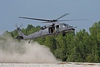 HH-60G approaching to the stony and sandy dry bed of the river, after concluding simulation of personnel recovery