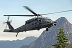 Approach to the narrow grassy strip. Flight engineer and gunner assist pilots in identifying any kind of obstacle during approach operation