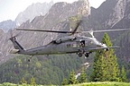 Approach to the narrow grassy strip. Flight engineer and gunner assist pilots in identifying any kind of obstacle during approach operation