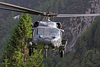 The 56th RQS HH-60G approaching to the grassy strip to simulate a personnel recovery with the hoist