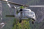 The 56th RQS HH-60G approaching to the grassy strip to simulate a personnel recovery with the hoist