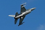 A F-16CM of the 555th Fighter Squadron "Triple Nickel" climbing after a simulated missed approach for runway 05. 