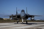 RSAF F-15C Eagle 210 also turning off the parallel runway towards the main runway