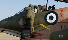 T-2 Buckeye student pilot descending the steps