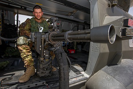 Good view of the gunner's platform and M134D Minigun mount, as well as the Saphir-M chaff/flare dispenser units of the EWS